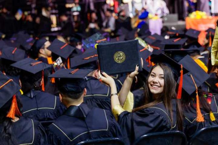 CU grad holding degree